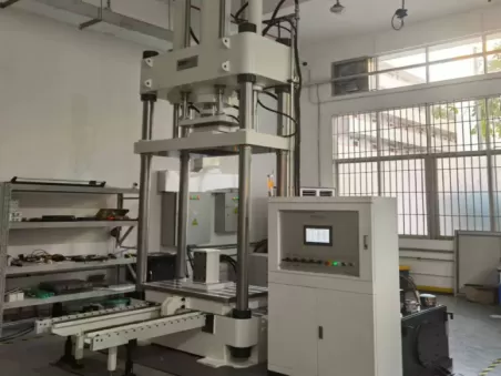 Why must servo-hydraulic presses be used for the assembly of electrolytic cell stacks?